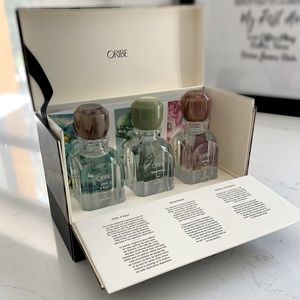 Oribe set of perfumes/colognes.